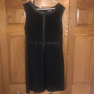Black dress with leather detailing by Roz & Ali